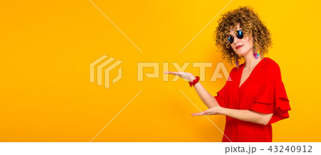 Attractive woman with short curly hair Attractive woman with short curly hair 43240912