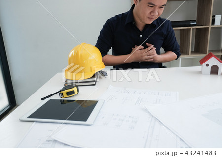 engineer suffering from chest pain. man have heart attack 43241483