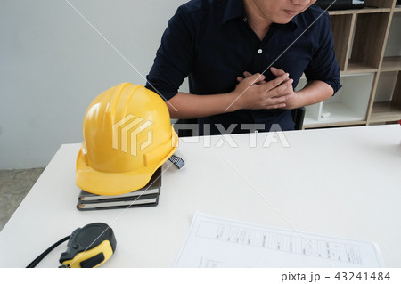 engineer suffering from chest pain. man have heart attack 43241484