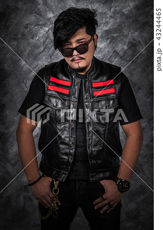 biker man in black leather jacket 43244465