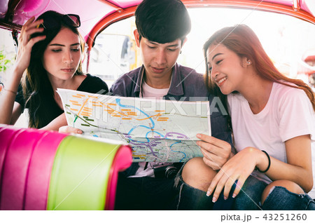 Group of tourist sitting in tuk-tuk taxi 43251260