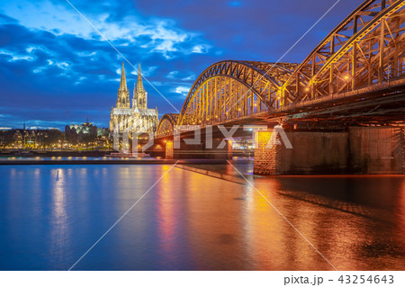 Cologne Cathedral at night and Hohenzollern Bridge 43254643
