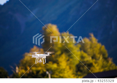 Photo of quadcopter against blue sky, bridge 43255329