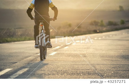 Ride on bike on the road. Ride on bike on the road. 43257271