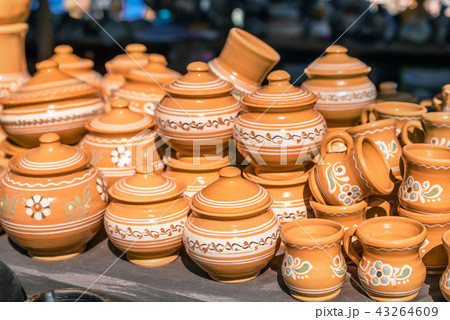 Clay dishes. Crockery made clay. Dishes background 43264609