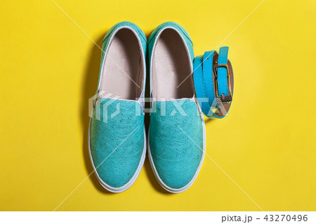 stylish women blue slip on shoes and a belt stylish women blue slip on shoes and a belt 43270496
