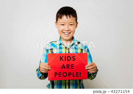Nice boy holding a table in the hand 43271154
