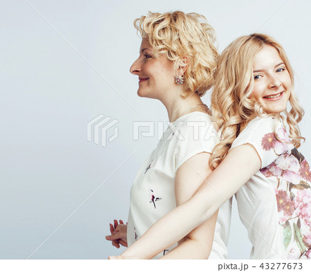 mother with daughter together posing happy smiling isolated on w mother with daughter together posing happy smiling isolated on w 43277673