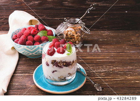 Layered yogurt with raspberries Layered yogurt with raspberries 43284289