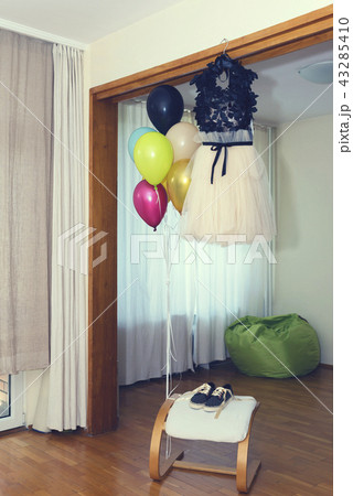 Fancy dress for the party and balloons are ready 43285410