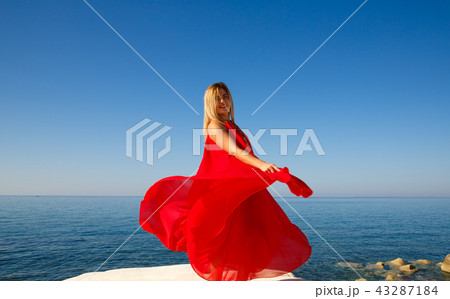 Woman in red 43287184