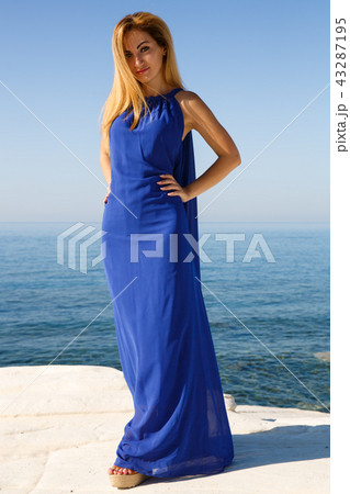 Blond woman in blue 43287195