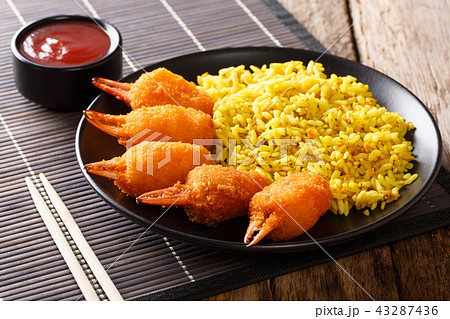 Portion of crab claws fried in breading 43287436