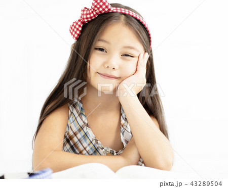 Closeup of smiling little girl with long hair 43289504