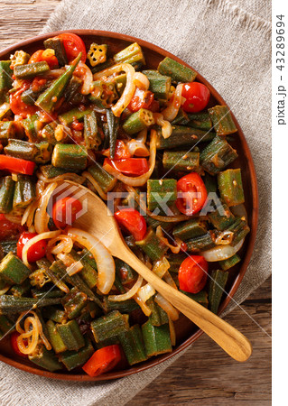Healthy dietary meal okra with tomatoes and onion 43289694
