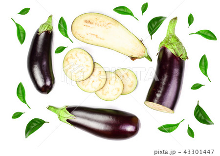 eggplant or aubergine isolated on white background decorated with green leaves. Top view. Flat lay eggplant or aubergine isolated on white background decorated with green leaves. Top view. Flat lay 43301447