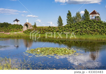 Park wih pond near St. Anne's Church,Mosar,Belarus Park wih pond near St. Anne's Church,Mosar,Belarus 43303483