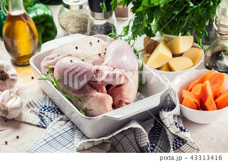 Whole raw chicken casserole dish 43313416