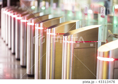 Glowing Turnstiles on an entrance to the subway Glowing Turnstiles on an entrance to the subway 43313476