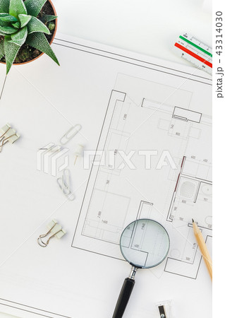 Interior designer table workplace with house plan 43314030