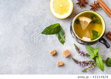 Cup of tea, mint and lemon, brown sugar cinnamon Cup of tea, mint and lemon, brown sugar cinnamon 43314828