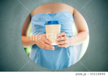 Hands with manicure and craft coffee cup 43319940
