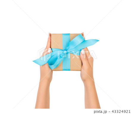 woman hands holding gift isolated on white 43324921