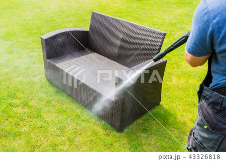 power washing garden furniture - made of rattan 43326818