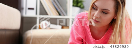 young beautiful blond woman lie on the floor read book young beautiful blond woman lie on the floor read book 43326989