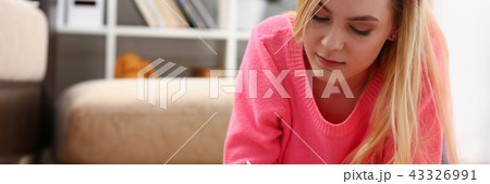 young beautiful blond woman lie on the floor read book young beautiful blond woman lie on the floor read book 43326991