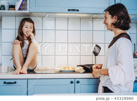 happy family cook together in the kitchen 43328980