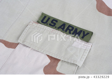 US ARMY branch tape on desert camouflage uniform US ARMY branch tape on desert camouflage uniform 43329229