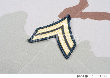 US ARMY Corporal rank patch on desert uniform 43331650
