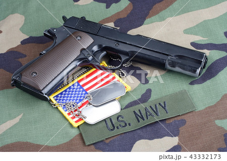 US NAVY branch tape, M1911 handgun with dog tags  43332173