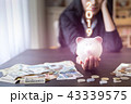 Successful business 2019.hands holding piggy bank. 43339575