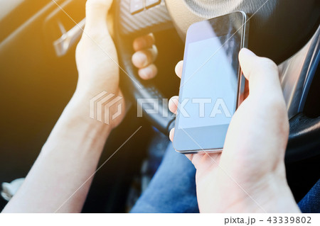 using mobile smart phone while driving the car using mobile smart phone while driving the car 43339802