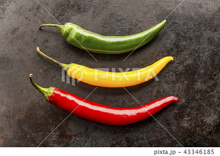chilli peppers on rusty metal background 43346185