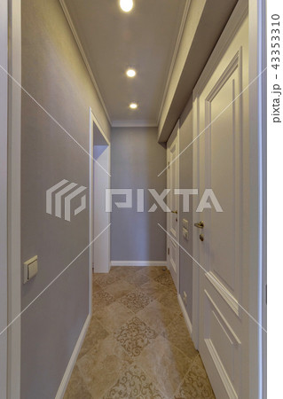 A light corridor with white doors A light corridor with white doors 43353310