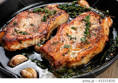 Roasted pork steak in frying pan 43355830