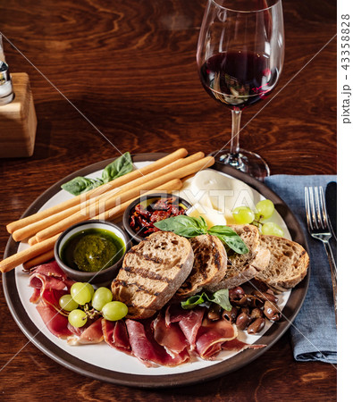 meat appetizer and wine 43358828