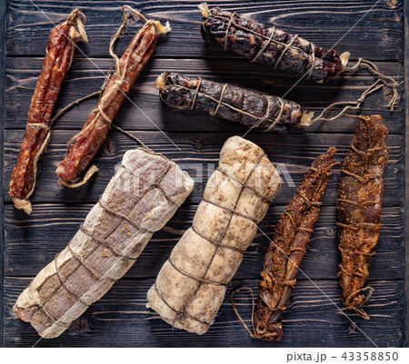 dried meat on the wooden background 43358850