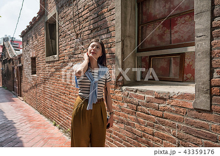 visiting the old chinese streets. 43359176