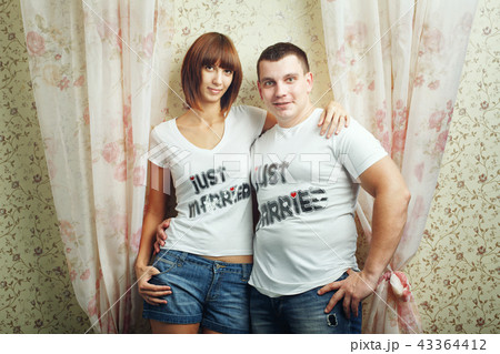 Newlyweds hugging 43364412