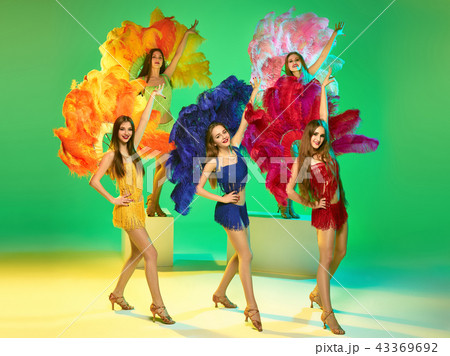 young beautiful dancers posing on studio background young beautiful dancers posing on studio background 43369692