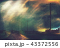 Moody dark rural road lined with telegraph poles 43372556