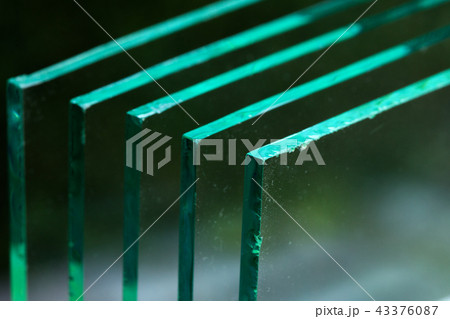 Sheets of Factory manufacturing tempered clear float glass panels cut to size Sheets of Factory manufacturing tempered clear float glass panels cut to size 43376087
