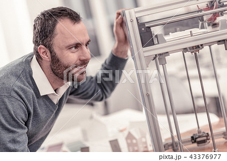 Bearded designer waiting when his prototype being ready 43376977