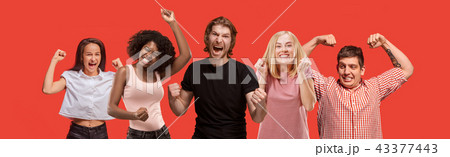 Winning success man happy ecstatic celebrating being a winner. Dynamic energetic image of male model Winning success man happy ecstatic celebrating being a winner. Dynamic energetic image of male model 43377443