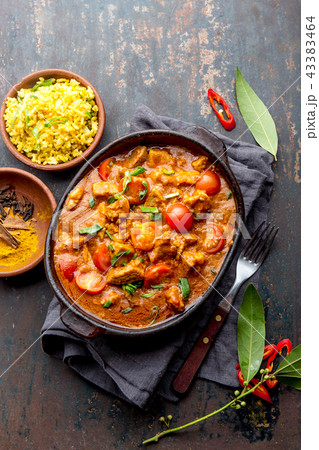 INDIAN FOOD. ROGAN JOSH curry sauce. Pork rogan josh with rice 43383464