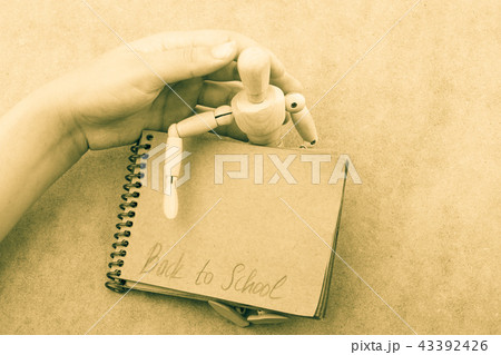 Back to school lettering in arm Back to school lettering in arm 43392426